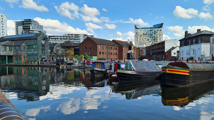 Canal boats moored on a canal in Birmingham.