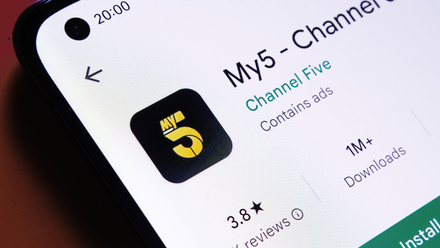 Close up of a smartphone with the My5 app icon in black and yellow and a green 'Install' button.