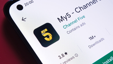 Close up of a smartphone with the My5 app icon in black and yellow and a green 'Install' button.