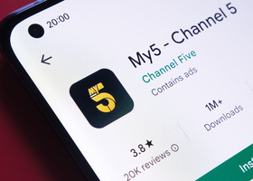 Close up of a smartphone with the My5 app icon in black and yellow and a green 'Install' button.