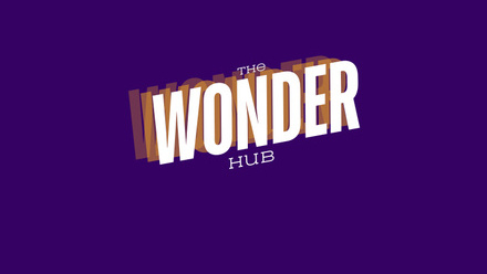 The WonderHub logo in white and orange on a purple background.