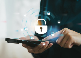 Person tapping a mobile phone with a secure digital lock icon.