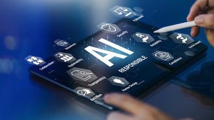 Person using a stylus on a digital tablet displaying the word “AI” surrounded by AI-related icons.