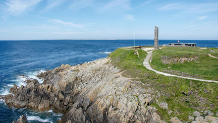 View of the rocky shore of the Pointe Saint-Mathieu coastline in Brittany, France.