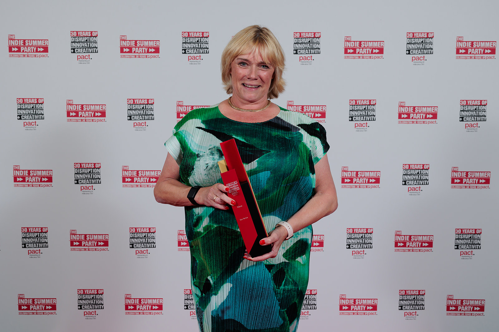 Sue Vertue of Hartswood Films with her Tribute trophy