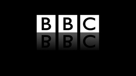 BBC Logo with reflection on black background.