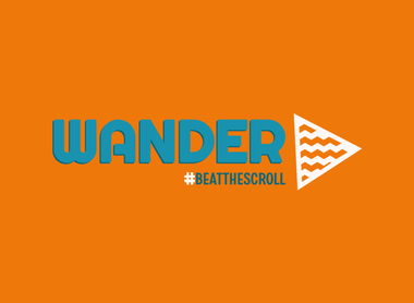 Wander logo in blue and white on a bright orange background.